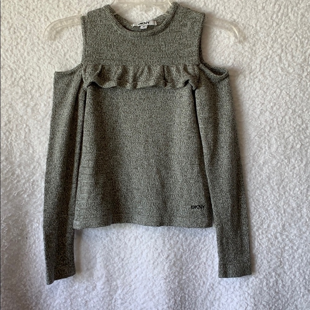 Girls peekaboo DKNY sweater size medium.